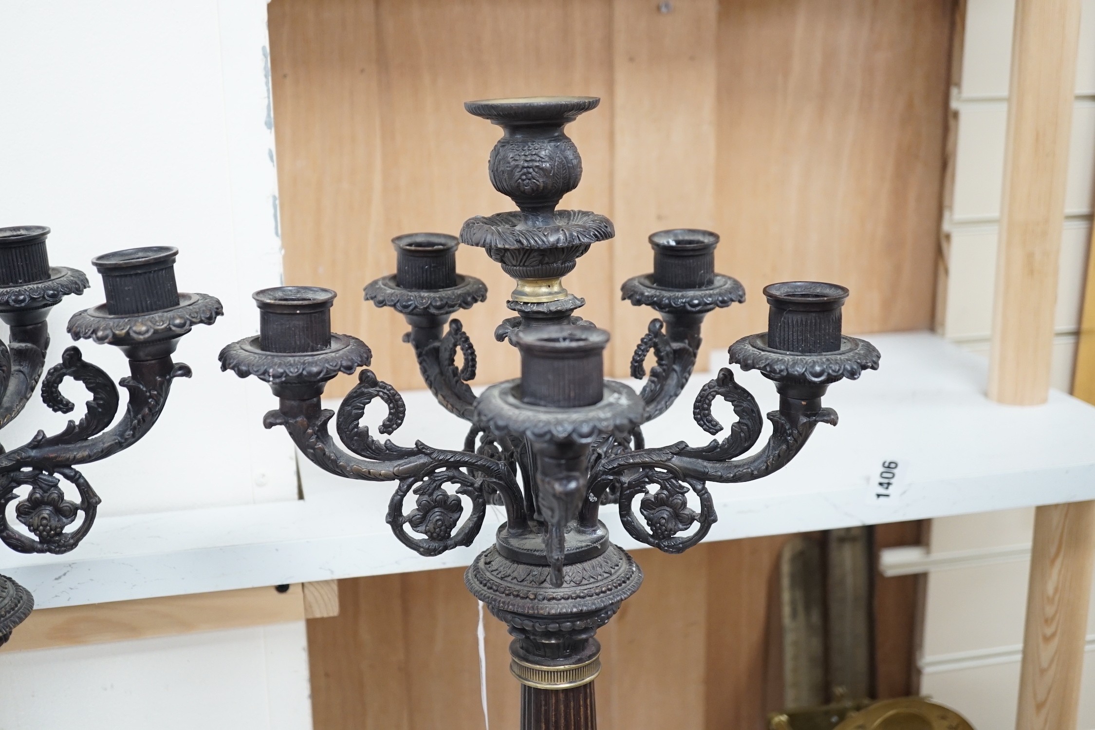 A pair of Empire style bronze candelabra, 71cm tall